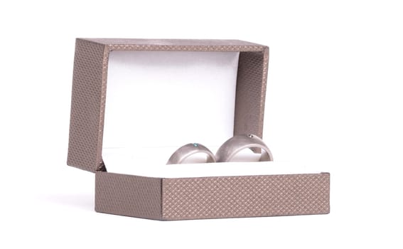 Wedding ring in box, isolated on white background