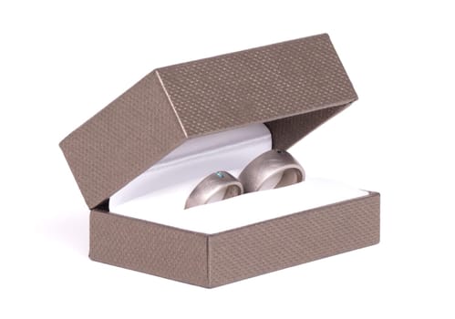 Wedding ring in box, isolated on white background