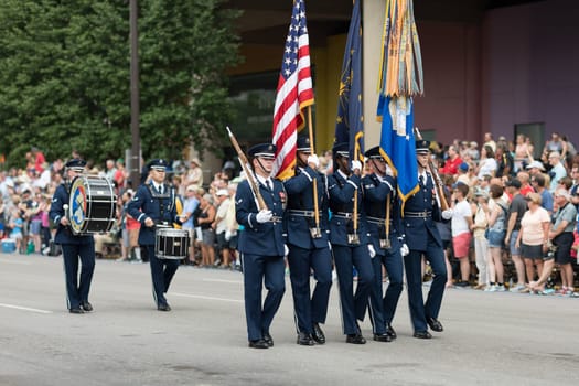 Indianapolis, Indiana, USA - May 26, 2018, Members of the US Air Force carry the American flag at the Indy 500 Parade