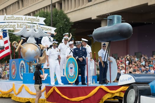 Indianapolis, Indiana, USA - May 26, 2018, Afloat carrying members of the US Military going down the street at the Indy 500 Parade
