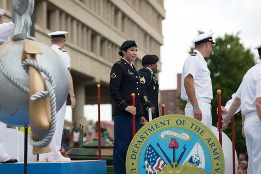 Indianapolis, Indiana, USA - May 26, 2018, Afloat carrying members of the US Military going down the street at the Indy 500 Parade