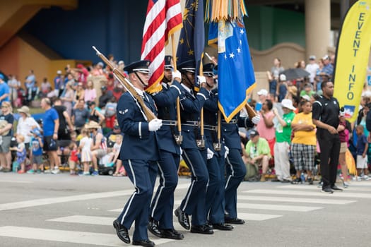 Indianapolis, Indiana, USA - May 26, 2018, Members of the US Air Force carry the American flag at the Indy 500 Parade