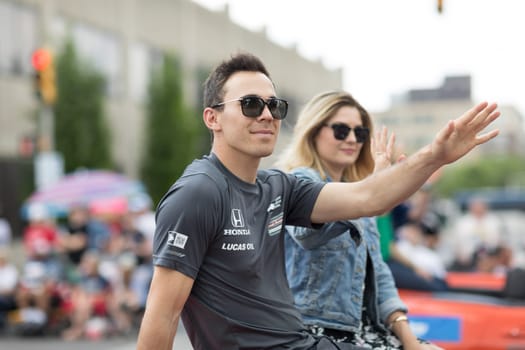 Indianapolis, Indiana, USA - May 26, 2018, Indycar driver Robert Wickens on a car goes down the street at the Indy 500 Parade