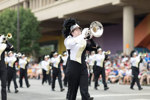 Indianapolis, Indiana, USA - May 26, 2018, Members of the Speedway High School Marching Band perform  at the Indy 500 Parade