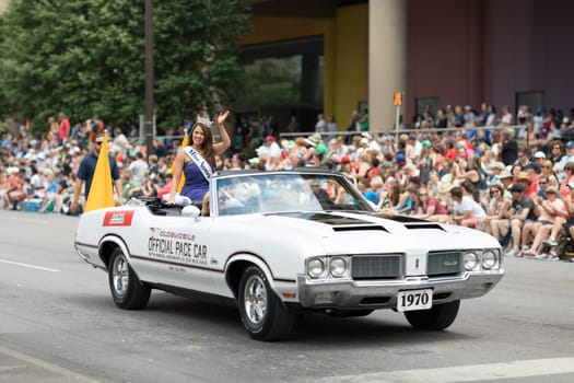 Indianapolis, Indiana, USA - May 26, 2018, Cara Mund, Miss America 2018 riding on an Oldsmobile 1970 classic car, at the Indy 500 Parade