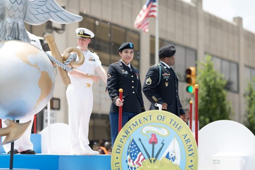 Indianapolis, Indiana, USA - May 26, 2018, Afloat carrying members of the US Military going down the street at the Indy 500 Parade