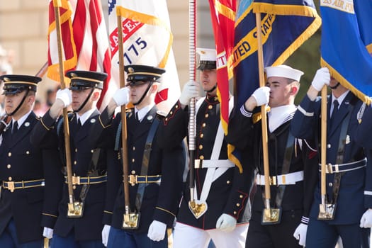 Washington, D.C., USA - April 14, 2018 Members of the USA military marching in the 2018 National Cherry Blossom Parade