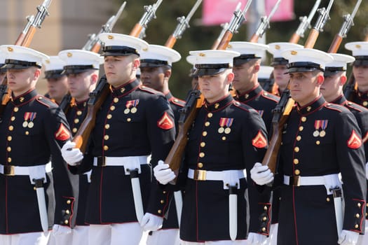 Washington, D.C., USA - April 14, 2018 Members of the USA military marching in the 2018 National Cherry Blossom Parade