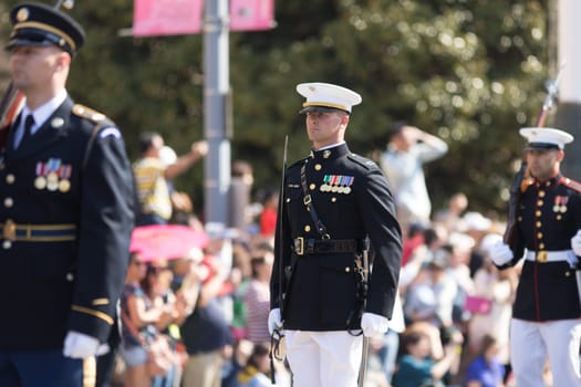 Washington, D.C., USA - April 14, 2018 Members of the USA military marching in the 2018 National Cherry Blossom Parade