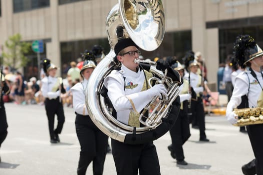 Indianapolis, Indiana, USA - May 26, 2018, Members of the Speedway High School Marching Band perform  at the Indy 500 Parade