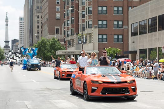 Indianapolis, Indiana, USA - May 26, 2018, Indycar driver Will Power on a car going down the road at the Indy 500 Parade