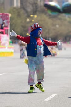 Washington, D.C., USA - April 14, 2018 Clowns going down the street in the 2018 National Cherry Blossom Parade