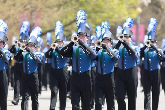 Washington, D.C., USA - April 14, 2018 The Jaguar Pride Marching Band of Blue Springs South High School going down the road in the 2018 National Cherry Blossom Parade