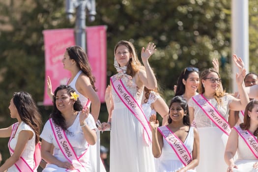 Washington, D.C., USA - April 14, 2018 Cherry Blossom Princesses in the 2018 National Cherry Blossom Parade