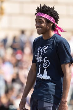 Washington, D.C., USA - April 14, 2018 Men skateboarding in the 2018 National Cherry Blossom Parade