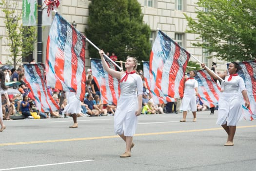 Washington, D.C., USA - July 4, 2017, The National Independence Day Parade is the  Fourth of July Parade in the capital of the United States, it  commemorates the adoption of the Declaration of Independence, only selected schools, and other groups participate.