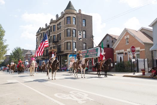 Chicago, Illinois, USA - September 16, 2017 - The Pilsen Mexican Independence Day Parade commemorates the Mexican Independence It features traditional folkloric, equestrian and Aztec dancing.