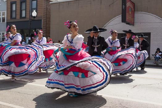 Chicago, Illinois, USA - September 16, 2017 - The Pilsen Mexican Independence Day Parade commemorates the Mexican Independence It features traditional folkloric, equestrian and Aztec dancing.