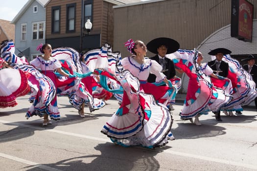 Chicago, Illinois, USA - September 16, 2017 - The Pilsen Mexican Independence Day Parade commemorates the Mexican Independence It features traditional folkloric, equestrian and Aztec dancing.