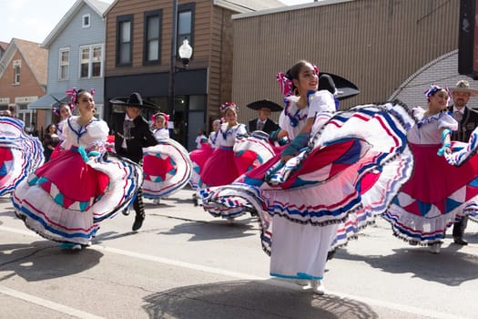 Chicago, Illinois, USA - September 16, 2017 - The Pilsen Mexican Independence Day Parade commemorates the Mexican Independence It features traditional folkloric, equestrian and Aztec dancing.