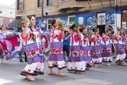 Chicago, Illinois, USA - September 16, 2017 - The Pilsen Mexican Independence Day Parade commemorates the Mexican Independence It features traditional folkloric, equestrian and Aztec dancing.