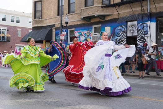 Chicago, Illinois, USA - September 16, 2017 - The Pilsen Mexican Independence Day Parade commemorates the Mexican Independence It features traditional folkloric, equestrian and Aztec dancing.
