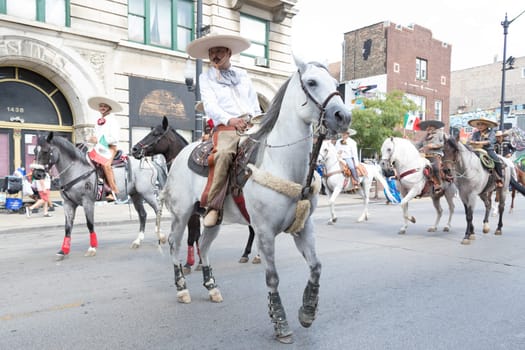 Chicago, Illinois, USA - September 16, 2017 - The Pilsen Mexican Independence Day Parade commemorates the Mexican Independence It features traditional folkloric, equestrian and Aztec dancing.