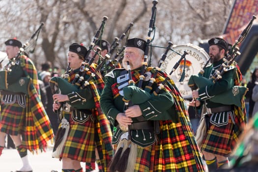 Chicago, Illinois, USA - March 17, 2018, The St. Patrick's Day Parade is a cultural and religious celebration from Ireland in honor of  Saint Patrick.