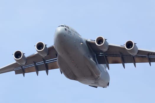 Louisville, Kentucky, USA - April 21, 2018 C-17 Globemaster cargo plane flying by at the Thunder Over Louisville