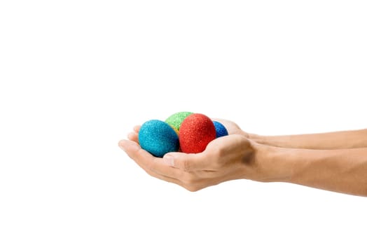 Human hands holding colorful easter eggs isolated over white background. Happy Easter