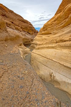 Colorful Slot Canyon in the Desert in Mosaic Canyon in Death Valley National Park in California