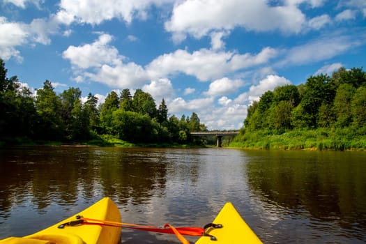 Kayak and canoe ride in river Gauja in Latvia. Boat ride by the river. Beautiful view of river from boat. The Gauja is the longest river in Latvia, which is located only in the territory of Latvia. Length - 452 km...