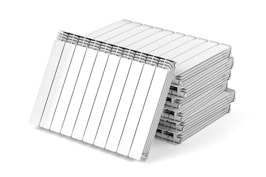 Stack with aluminum heating radiators on white background