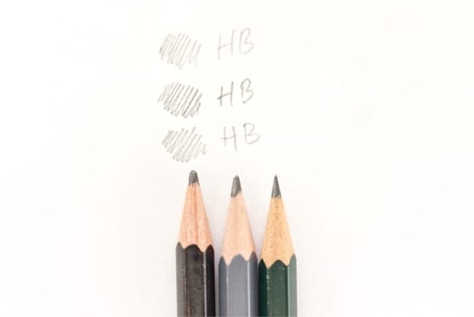 three pencils side by side with different strokes by the same number
