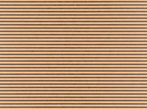 Brown craft paper with a black horizontal stripes