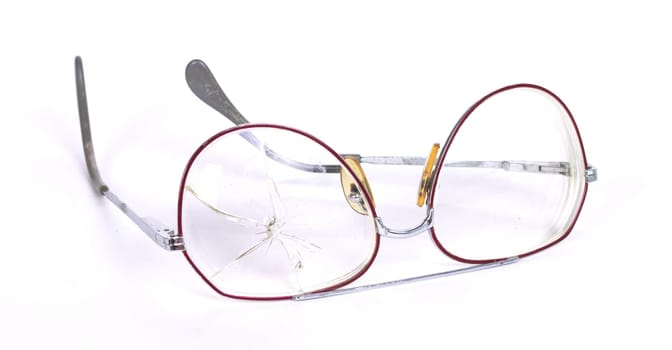 Vintage glasses, broken, isolated on a wwhite background