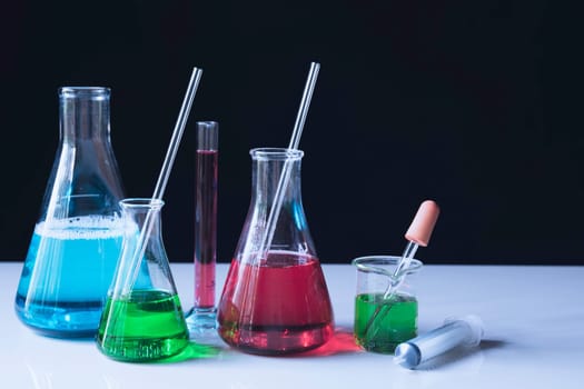 Glass laboratory chemical test tubes with liquid for analytical , medical, pharmaceutical and scientific research concept.