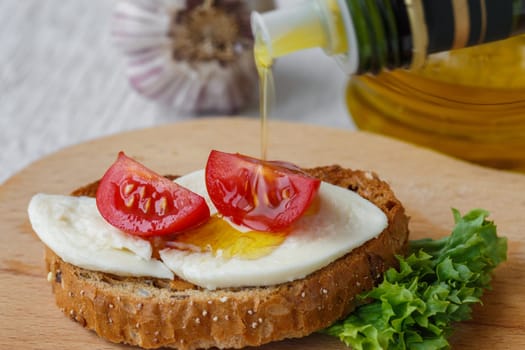 Bruschetta with mozzarella and cherry tomatoes on a sheet of lettuce