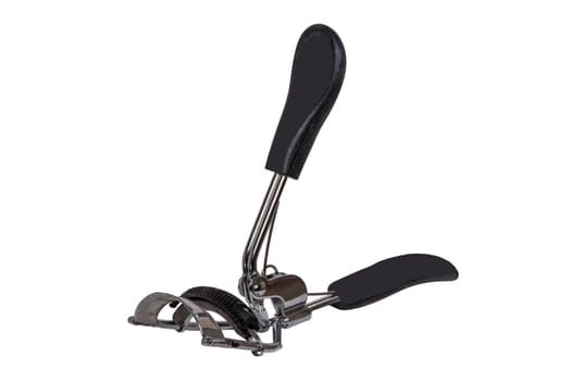 Concept beauty. Closeup eyelash curler or plier for eyelashes isolated on a white background.