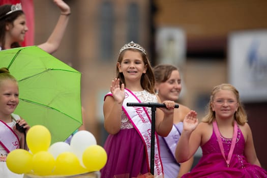 Peru, Indiana, USA - July 21, 2018 The Beauty queens going down the road at the Circus City Festival Parade