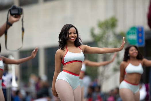 Indianapolis, Indiana, USA - September 22, 2018: The Circle City Classic Parade, African american cheerleader from Howard University dancing during the parade