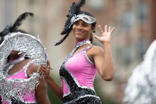 Indianapolis, Indiana, USA - September 22, 2018: The Circle City Classic Parade, Members of the Elite Striders drill tream dancing during the parade