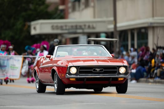 Indianapolis, Indiana, USA - September 22, 2018: The Circle City Classic Parade, A Ford Mustang classic sports car going down the road