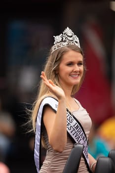 Peru, Indiana, USA - July 21, 2018 The Beauty queens going down the road at the Circus City Festival Parade