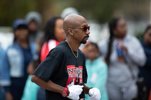 Indianapolis, Indiana, USA - September 22, 2018: The Circle City Classic Parade, African american man on roller skates dancing during the parade