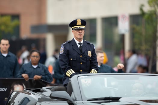 Indianapolis, Indiana, USA - September 22, 2018: The Circle City Classic Parade, Chief of the Indianapolis metropolitan police department, going down the road