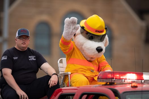 Peru, Indiana, USA - July 21, 2018 Sparky the mascot of the Mexico Fire Department at the Circus City Festival Parade