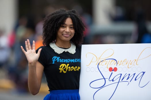 Indianapolis, Indiana, USA - September 22, 2018: The Circle City Classic Parade, Members of  Sigma Gamma Rho Sorority dancing during the parade