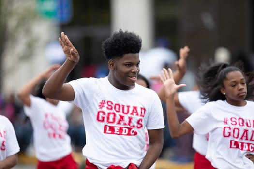 Indianapolis, Indiana, USA - September 22, 2018: The Circle City Classic Parade, Members of La Nique Expression Dance Company, dancing at the parade