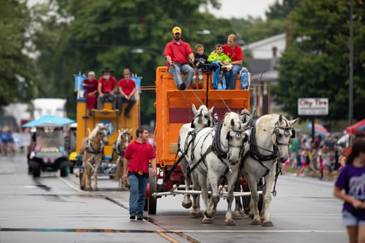 Peru, Indiana, USA - July 21, 2018 Two horses pulling a Circus wagon at the Circus City Festival Parade